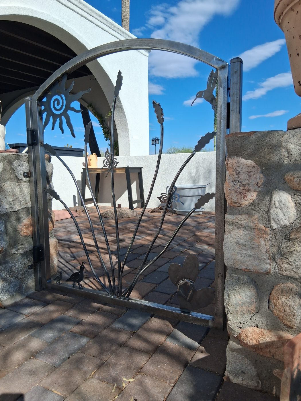 Arched steel gate detail — Emery Welding & Ironwork