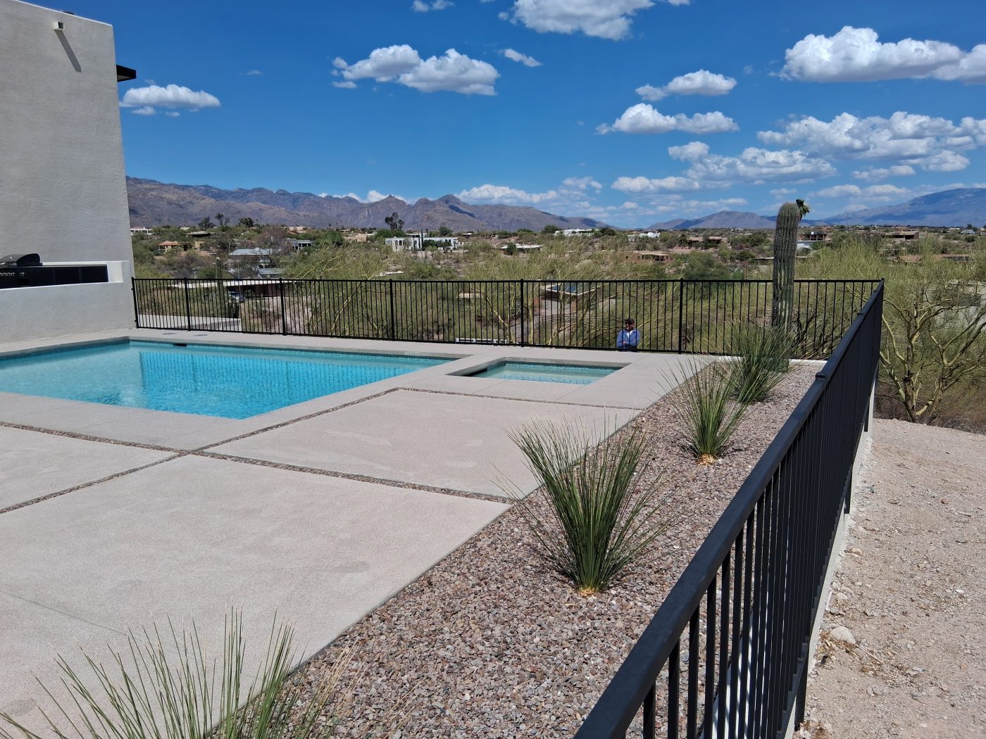 Black iron pool fence desert view — Emery Welding & Ironwork