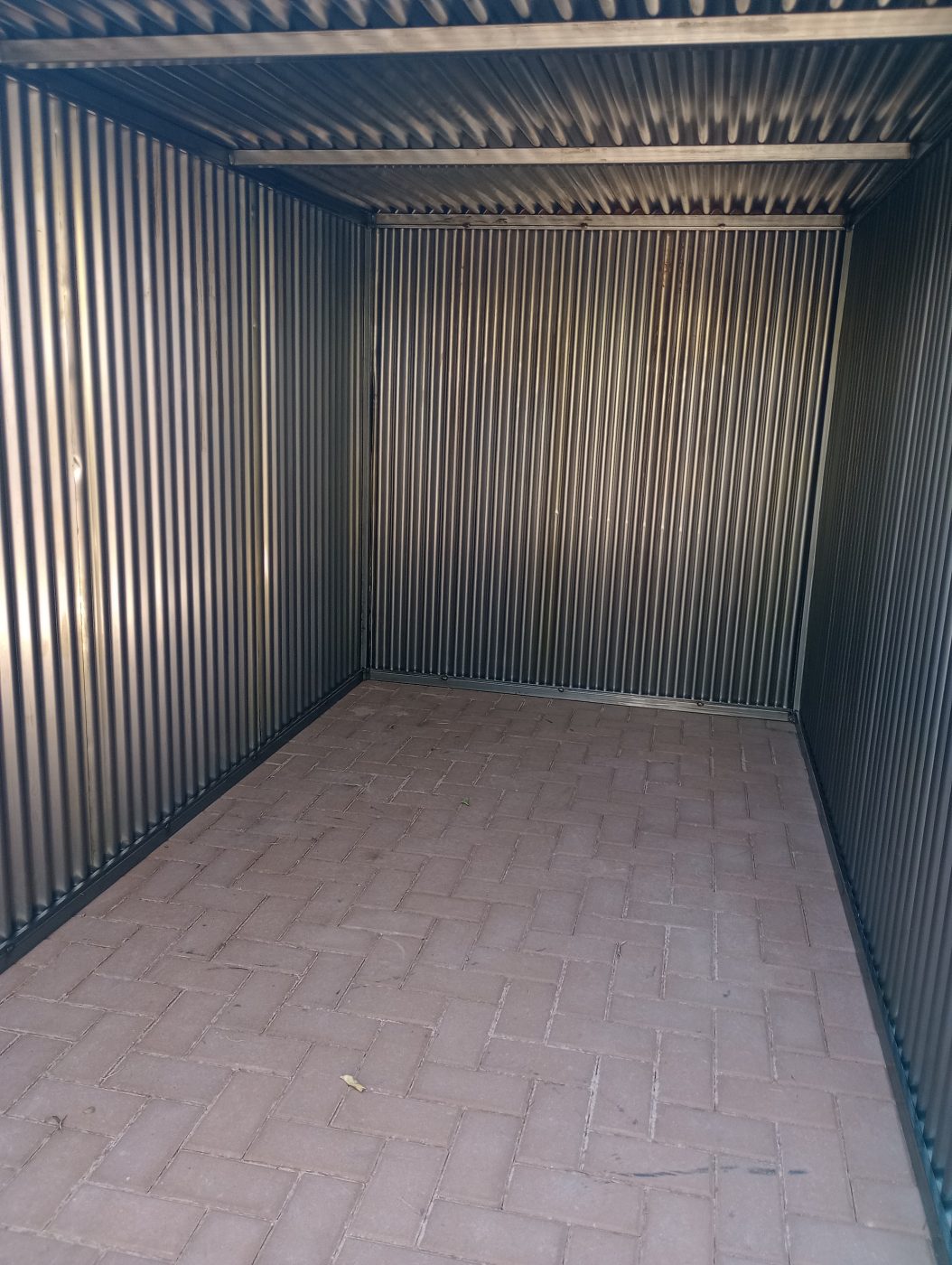 Corrugated metal storage enclosure — Emery Welding & Ironwork