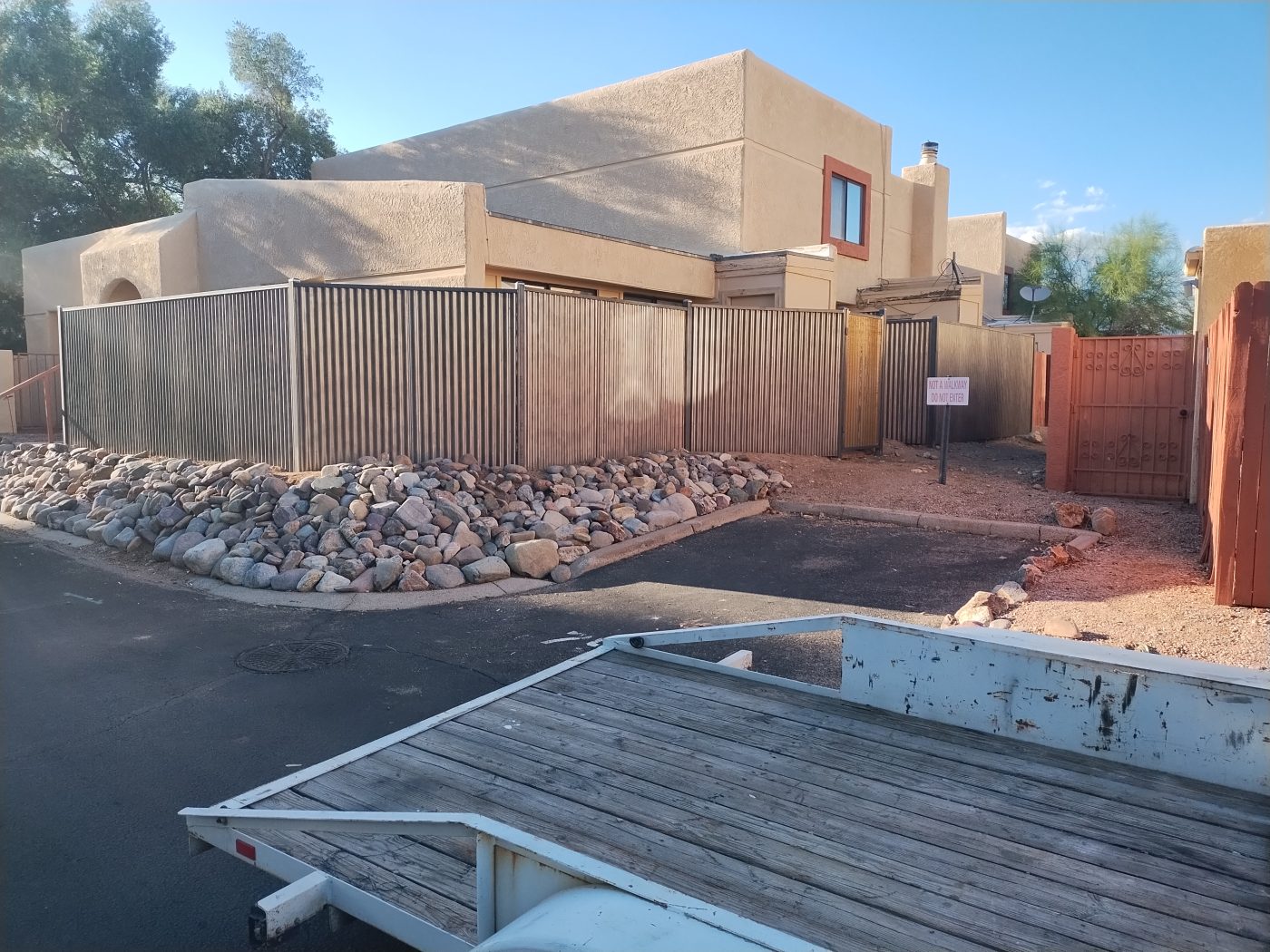 Corrugated metal yard fence — Emery Welding & Ironwork