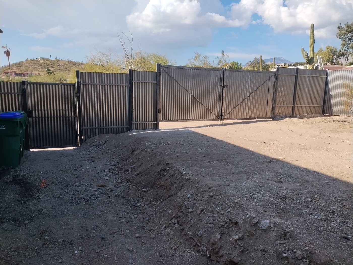 Corrugated steel fence and gate — Emery Welding & Ironwork