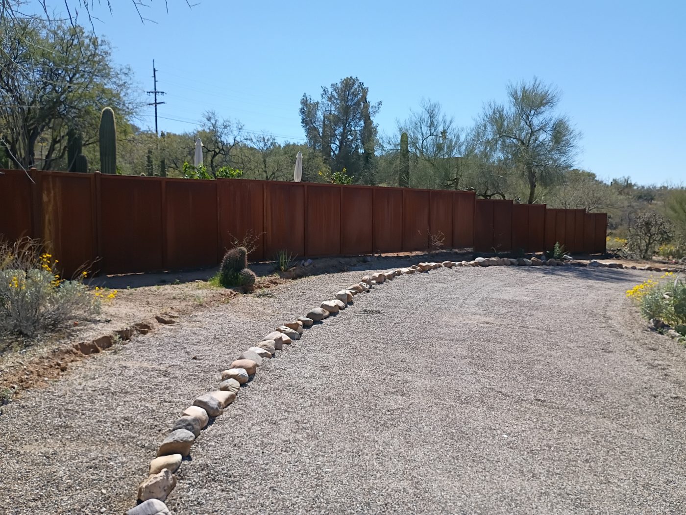 Corten corrugated privacy fence — Emery Welding & Ironwork