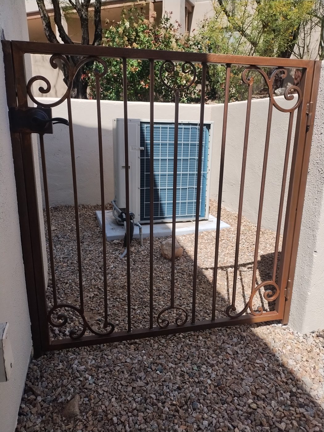 Custom iron entry gate — Emery Welding & Ironwork