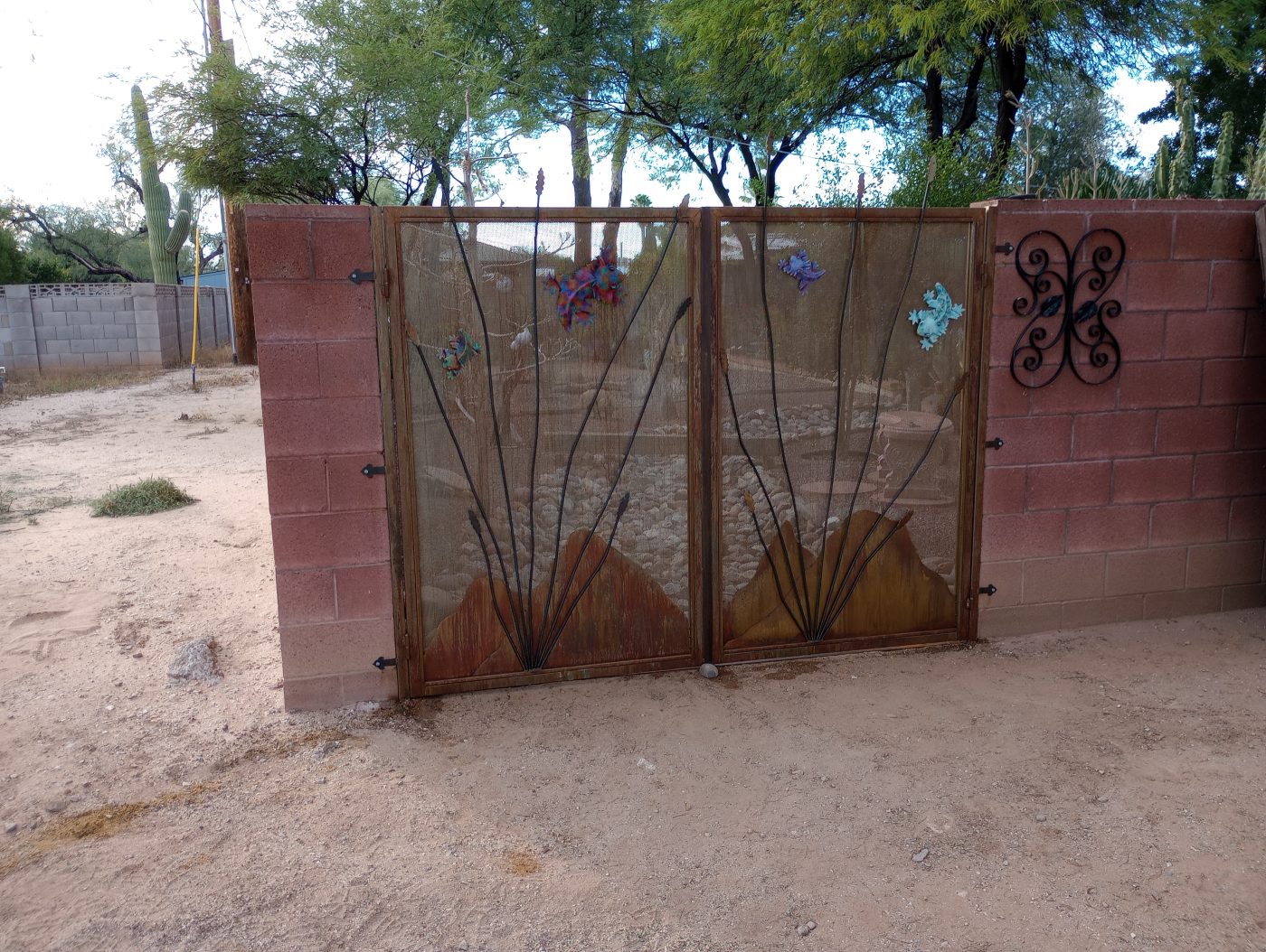 Decorative wrought iron scroll gate — Emery Welding & Ironwork
