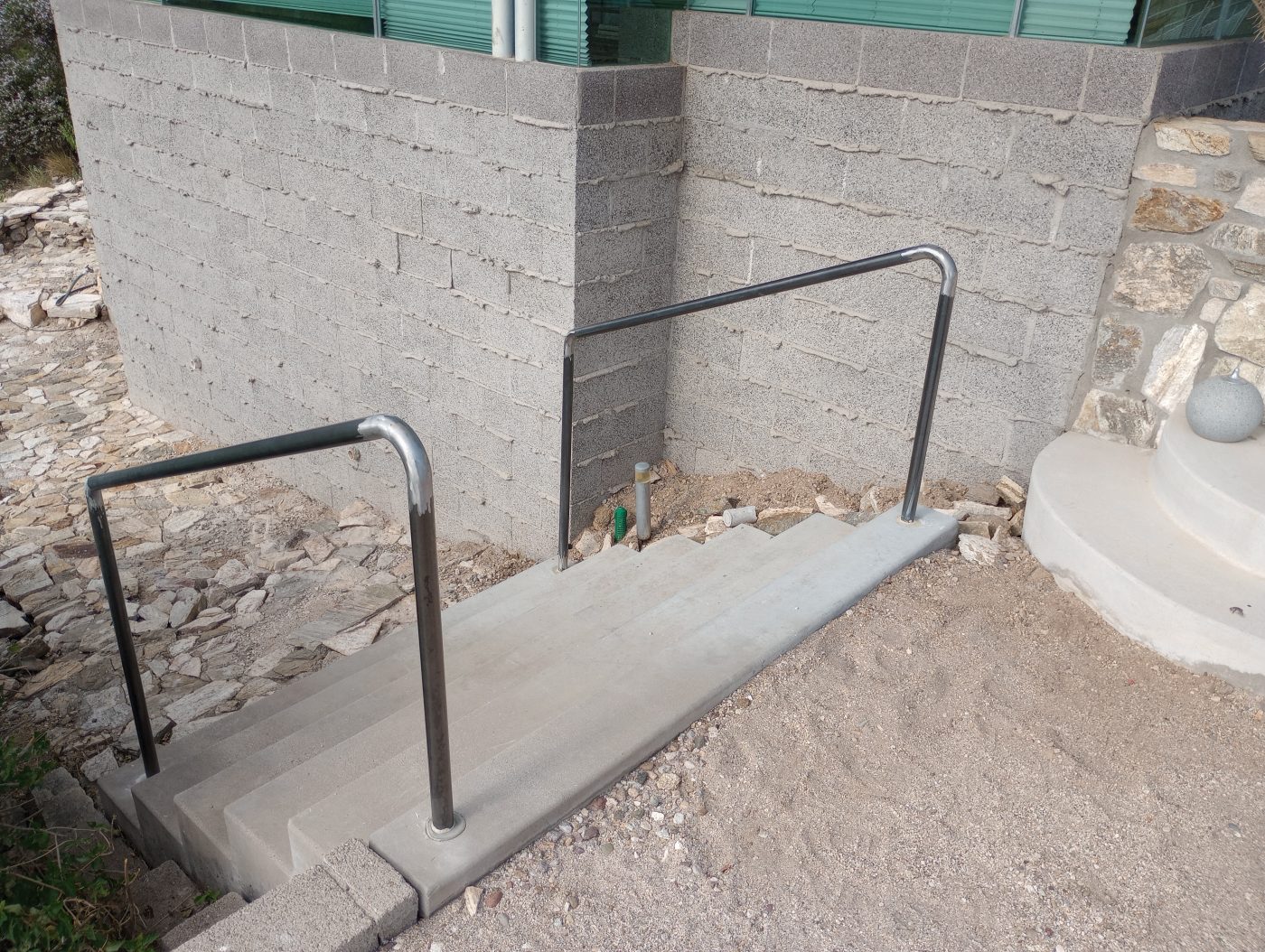 Exterior stucco steps handrail — Emery Welding & Ironwork