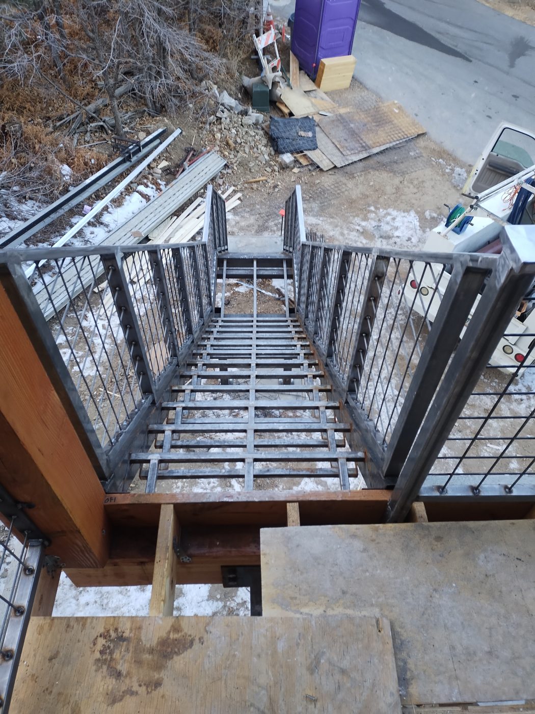 Industrial steel stair landing — Emery Welding & Ironwork