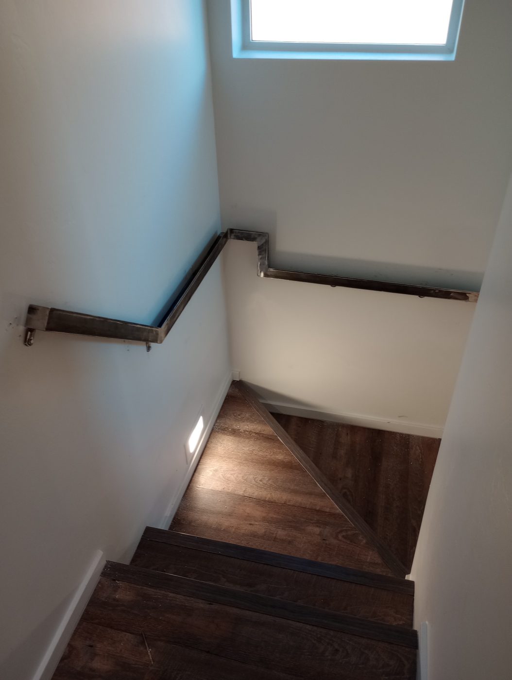 Interior stairs metal handrail lighting — Emery Welding & Ironwork