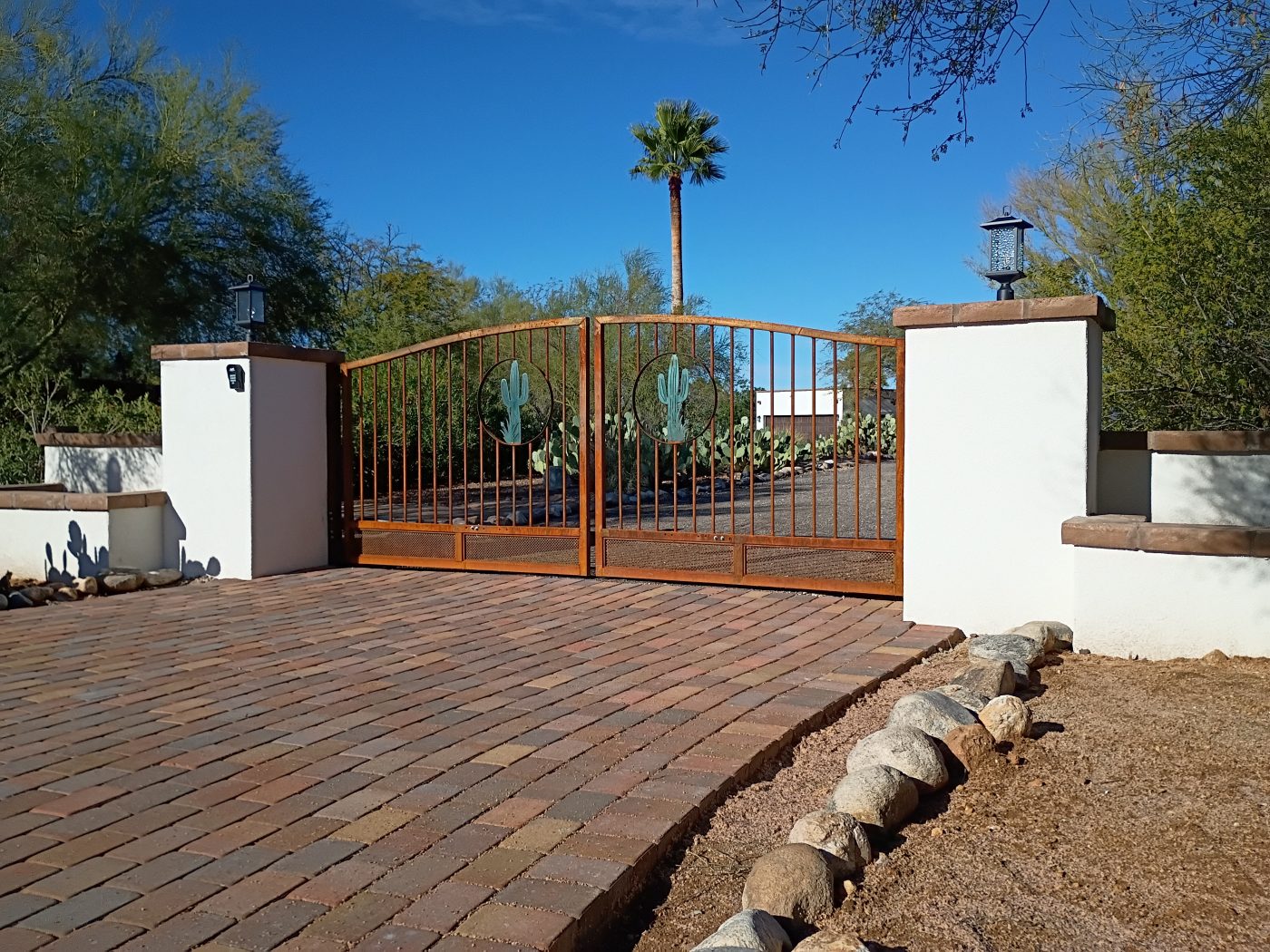 Iron driveway gate paver entrance — Emery Welding & Ironwork