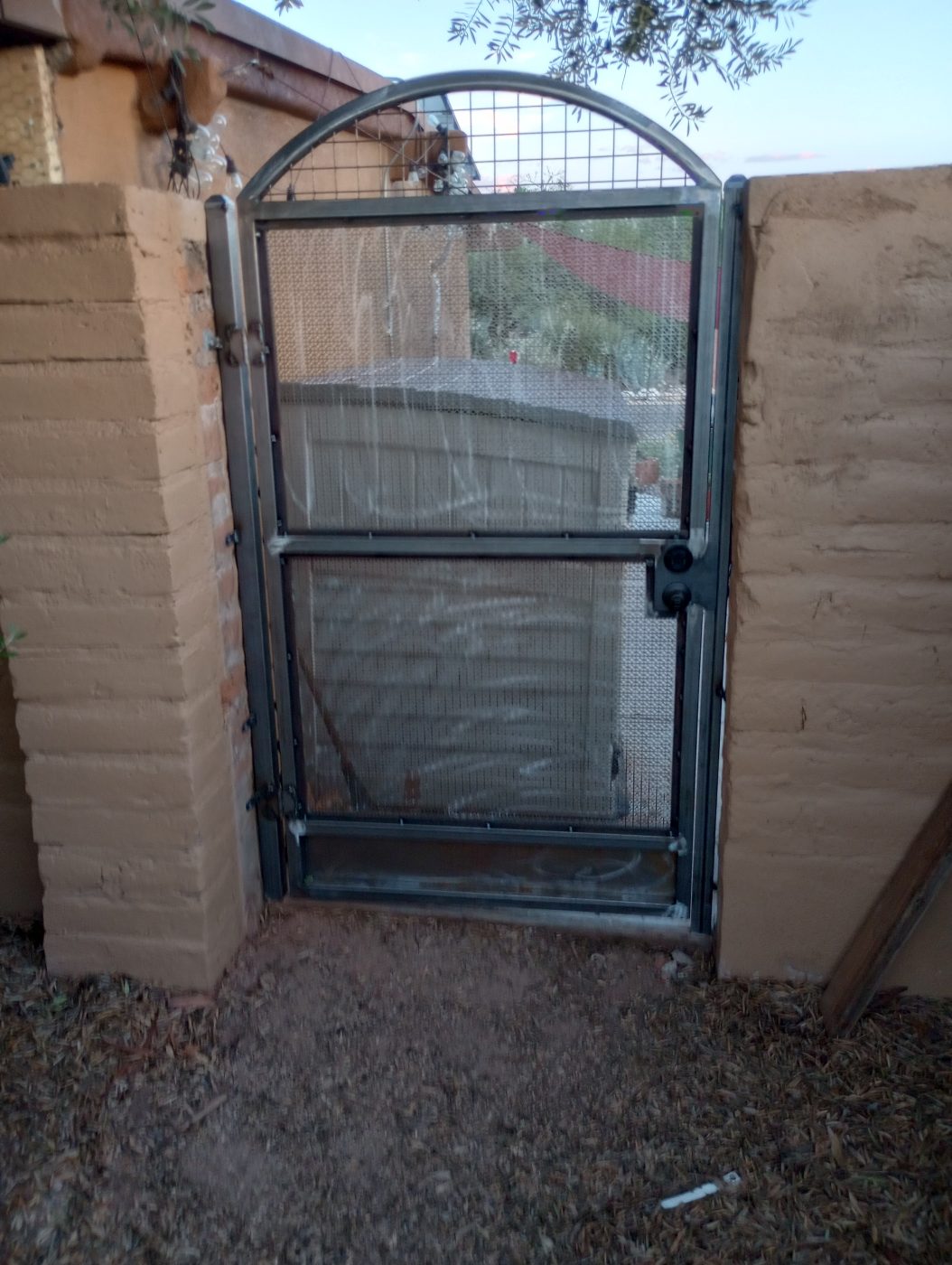 Metal mesh security gate — Emery Welding & Ironwork
