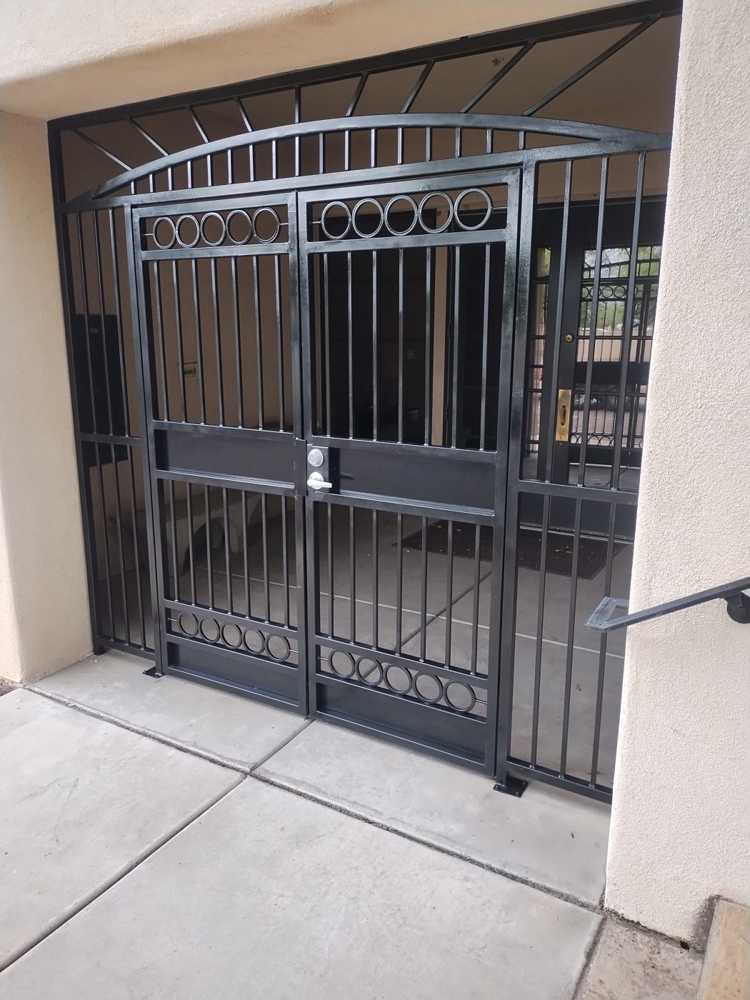 Ornamental iron double security gate — Emery Welding & Ironwork
