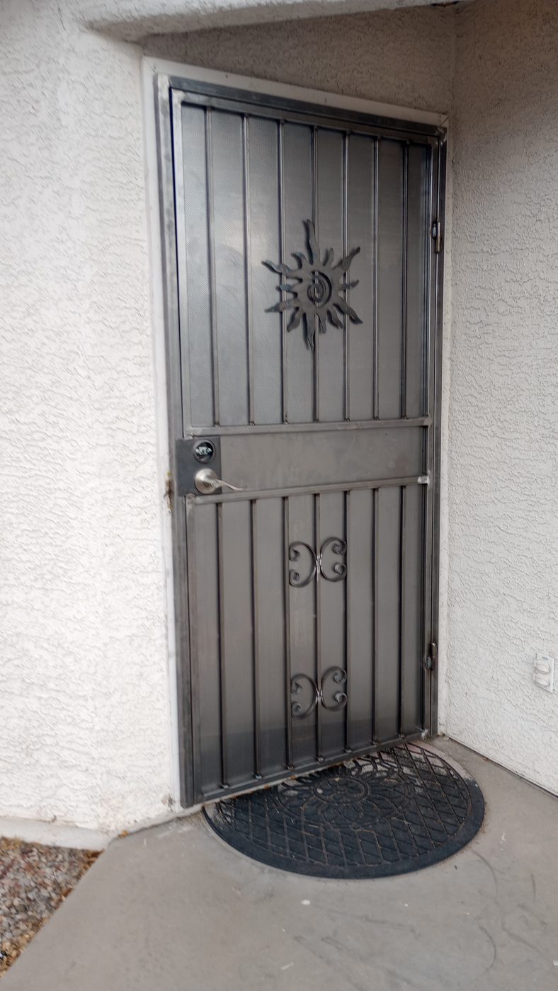 Ornamental iron security screen door — Emery Welding & Ironwork
