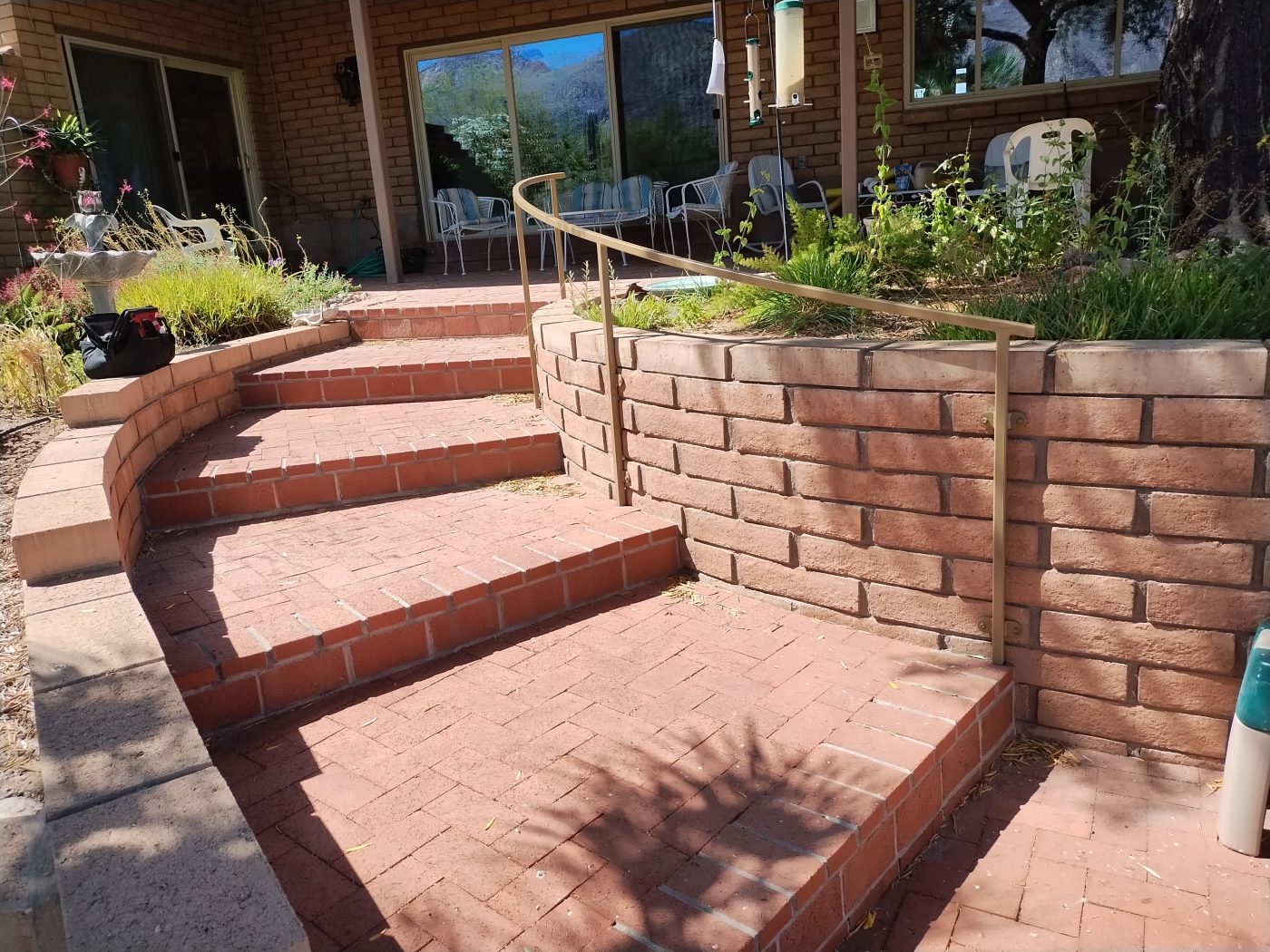 Paver steps with metal handrail — Emery Welding & Ironwork
