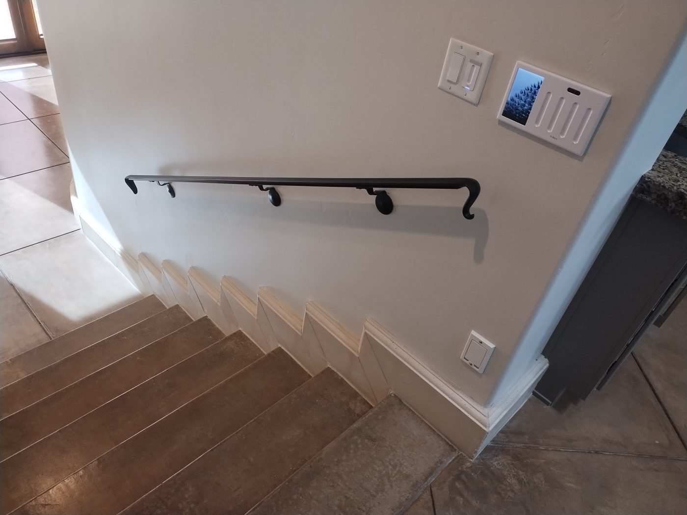 Tile staircase steel handrail — Emery Welding & Ironwork